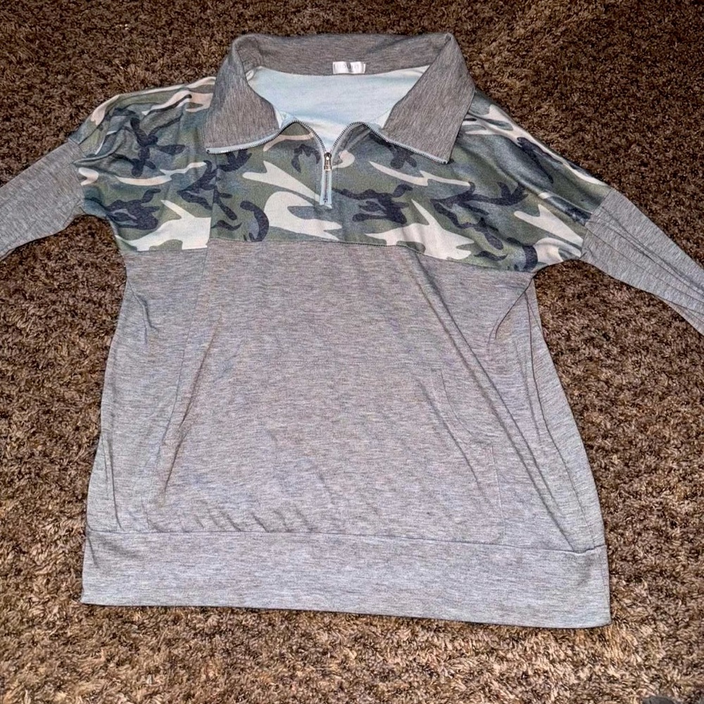 Woman’s crew neck sweater.